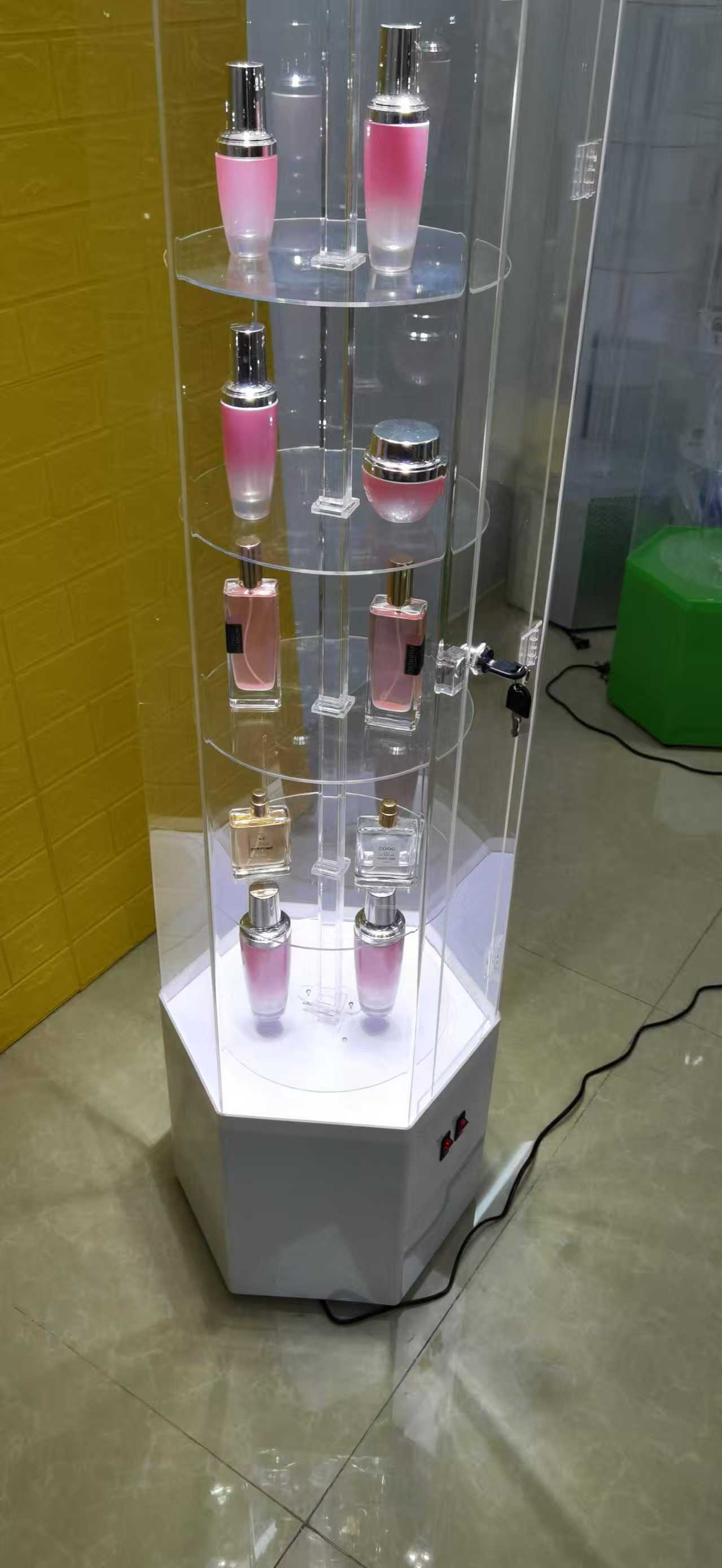 Acrylic rotating perfume display stand