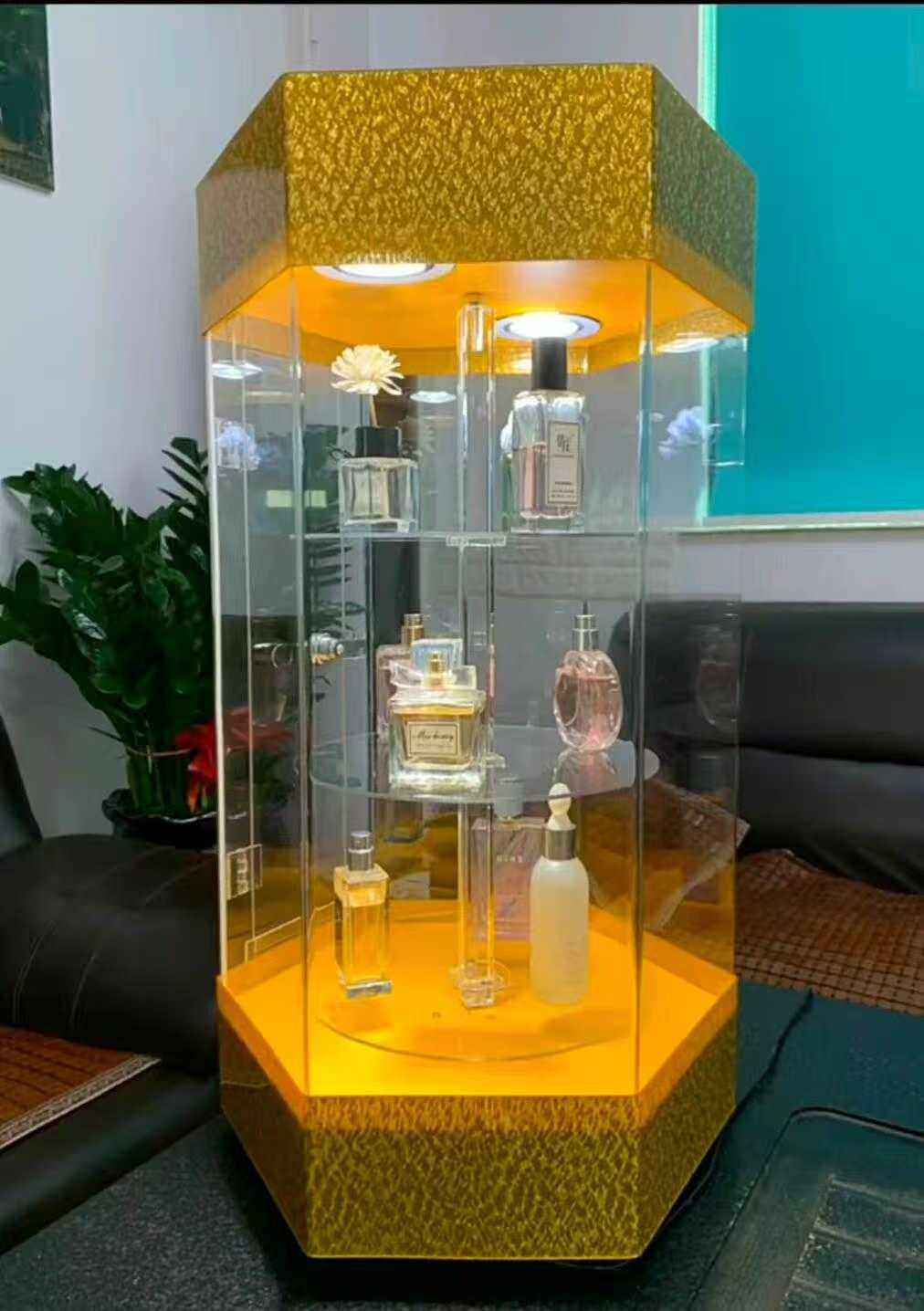 Acrylic rotating perfume display stand