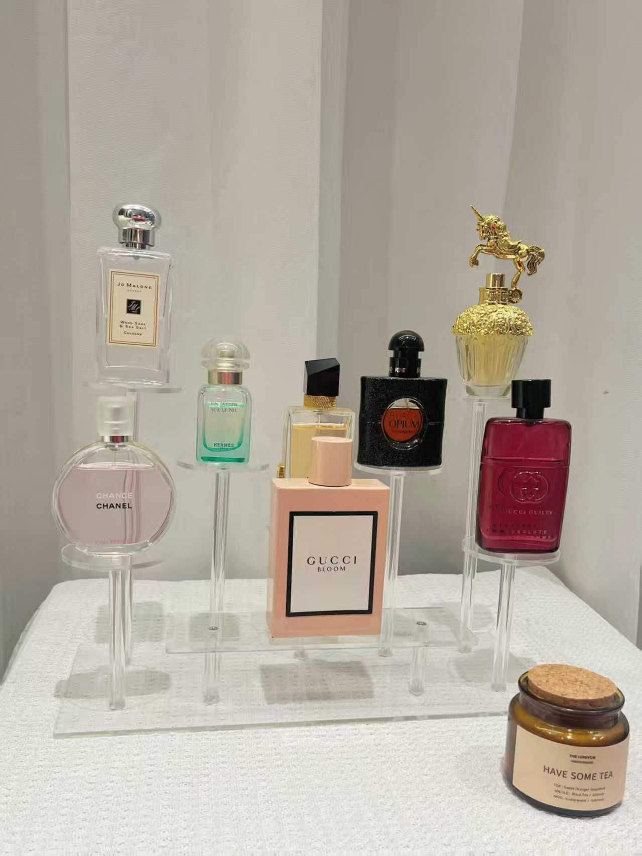 Transparent acrylic perfume display stand
